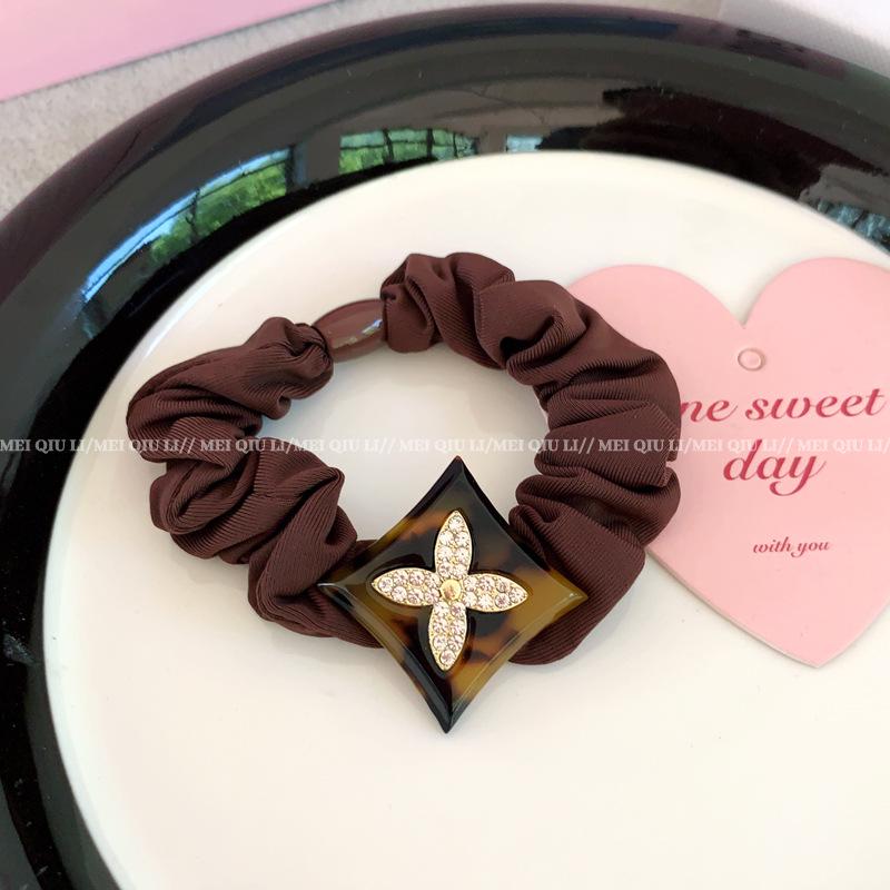 

Осенняя резинка для волос с четырьмя листочками клевера и стразами – высокая эластичная, модная, резинка для хвоста кофейный