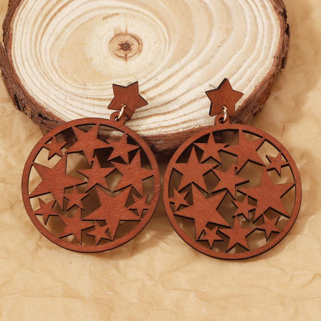 A niche Korean version of wooden earrings with a hollowed-out design, artistic and retro star-shaped earrings