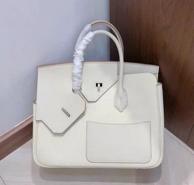 New genuine leather women's bag top layer cowhide 30CM irregular diagonal hijab Desordre handbag