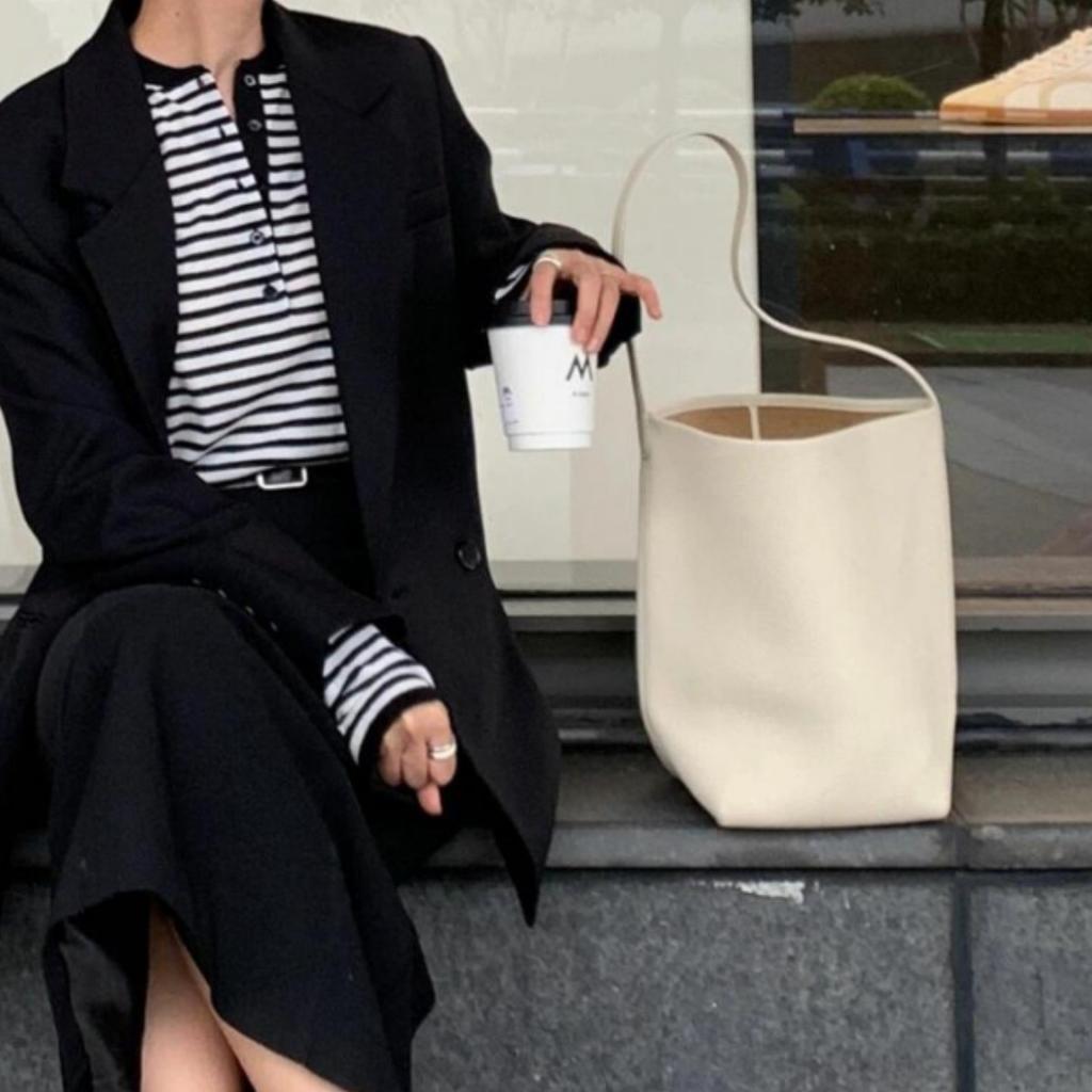 Haute couture niche TR bucket bag women's first layer cowhide minimalist high sense portable large capacity commuting shoulder tote bag