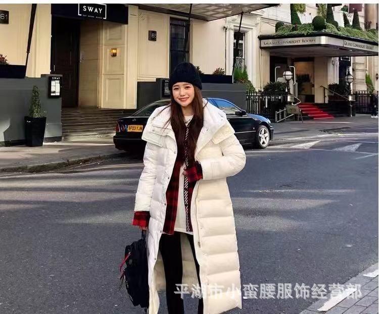 Dongdaemun white duck down thickened down jacket women's new long knee fashion women's clothing autumn and winter waist hooded jacket tide