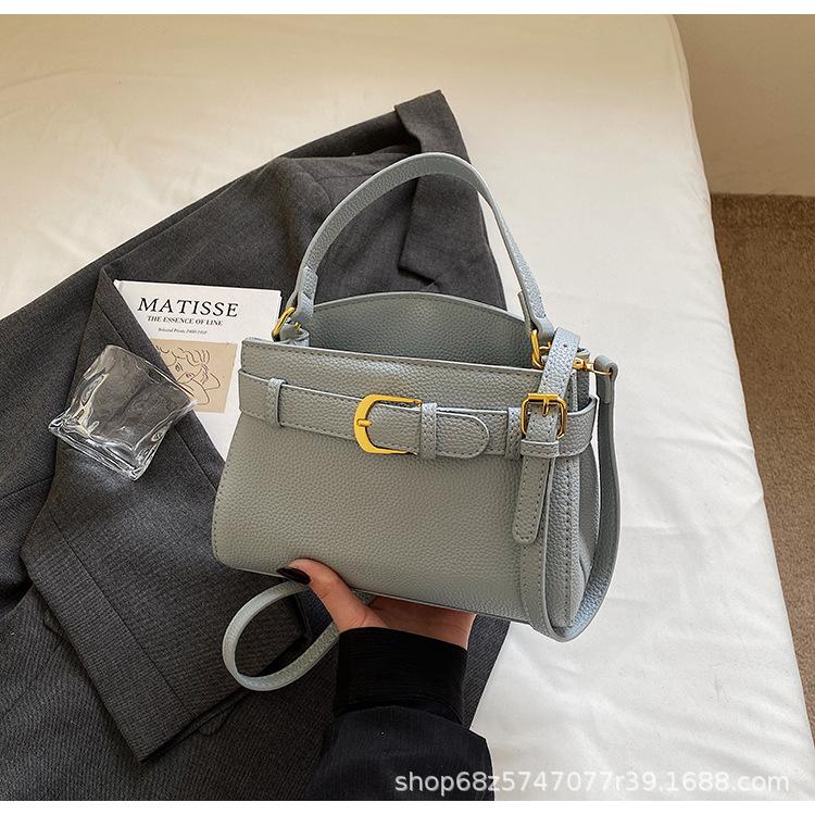 

Hand-held Kelly bag women s 2025 new high-end niche retro niche design versatile one-shoulder crossbody bag синий