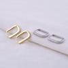 Manchettes d'oreille géométriques style coréen en forme de U incrustées de diamants: Boucles d'oreilles mode femme Été 2025
