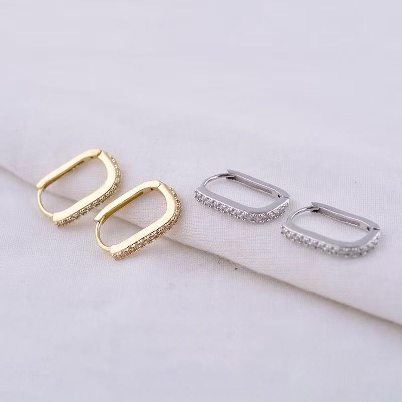 Manchettes d'oreille géométriques style coréen en forme de U incrustées de diamants: Boucles d'oreilles mode femme Été 2025