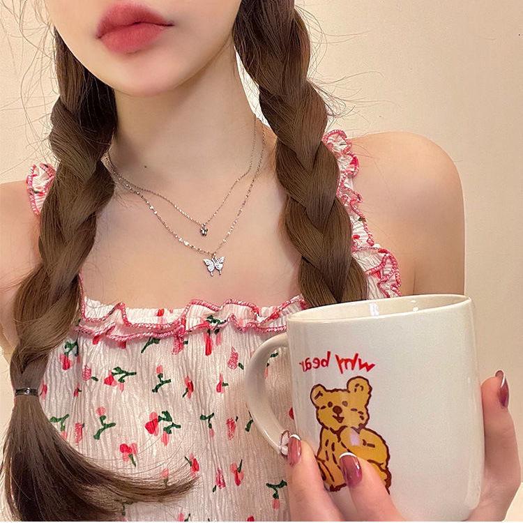 Double Layer Butterfly Necklace: Women's Light Luxury Collarbone Chain, Trendy Niche Design Pendant for 2025.