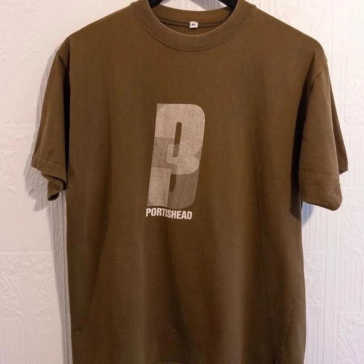 

Portishead band Short sleeve Dark Chocolate Color T shirt Sizes S5XL T390 Unisex T-Shirt S