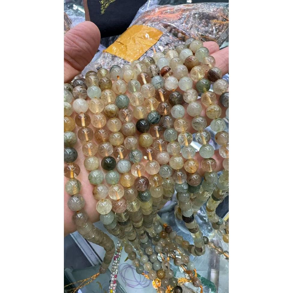 Natural Rainbow Rutilated Quartz Bead Bracelet diy Bead materials: single golden rutilated quartz, green rutilated quartz, titanium crystal, crystal Pearl6mm about60Piece