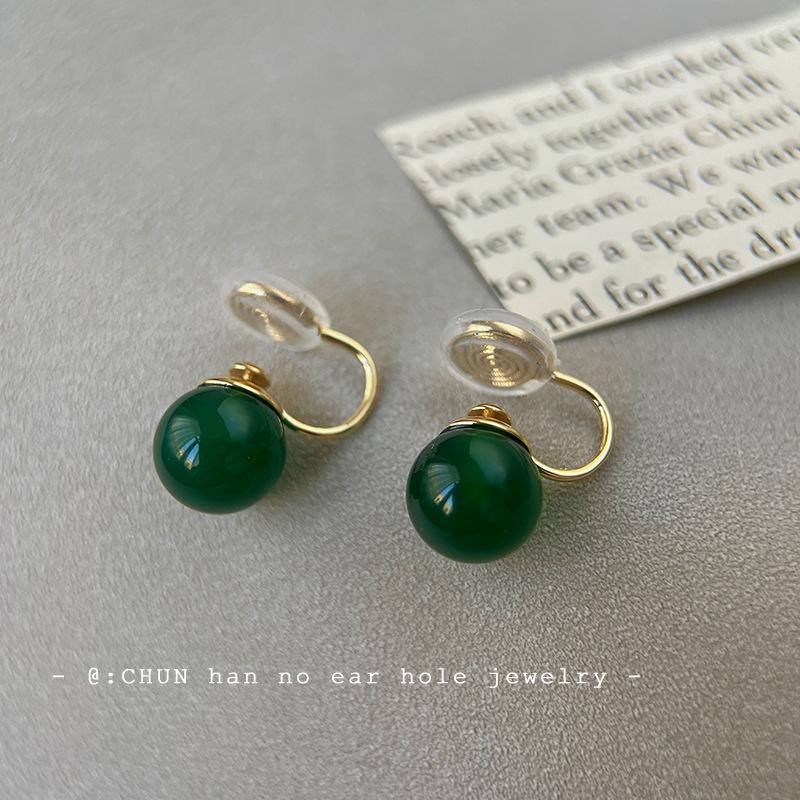 

Green agate new Chinese retro ear clips premium versatile emerald ball niche cold mosquito coil disc earrings women