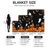 1 piece Halloween-themed black flannel blanket with orange pumpkins and ghosts, soft for sofa, bed, office, all-season use.