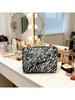 YSL Makeup Bag, Featuring a Zebra Print Design and Zipper Closure, Suitable for Everyday Use, Work, Travel, and School.