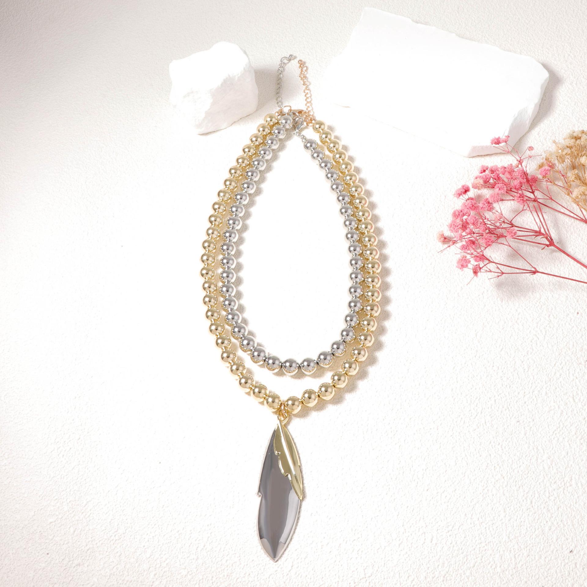 Simple and fashionable color matching double-layer stacking wearing CCB round beads geometric leaf pendant necklace, versatile commuter model