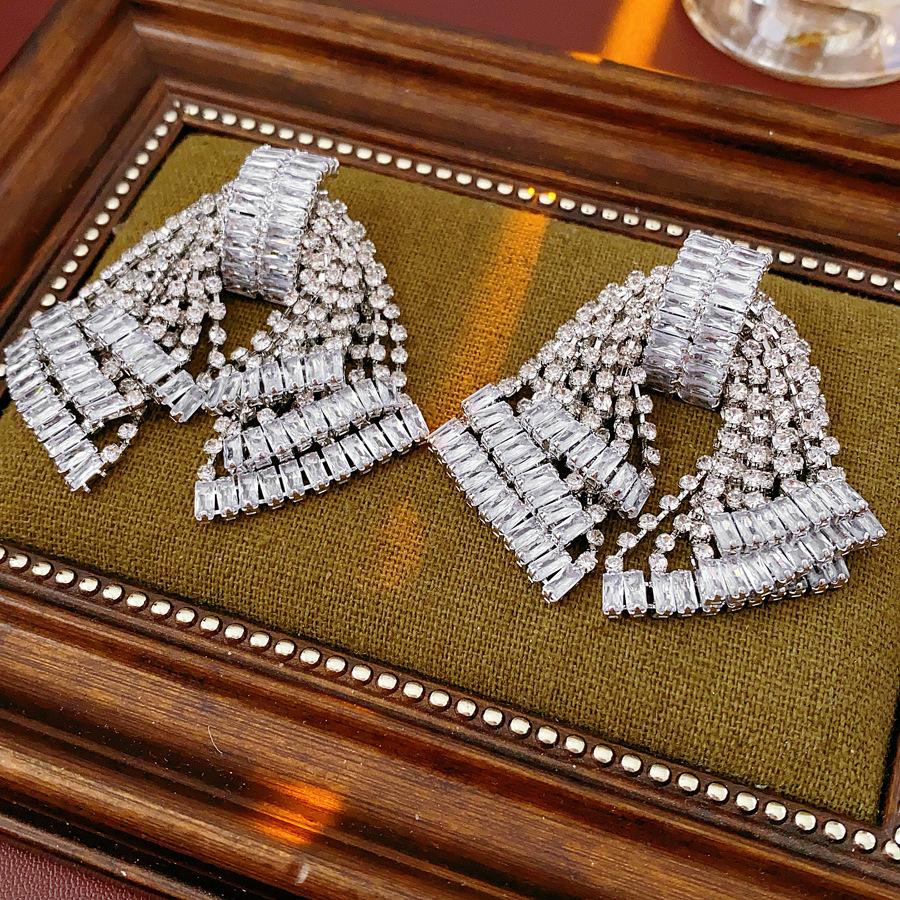 Bow Tassel Fashion Versatile Exaggerated Earrings 1 pair of earrings серебряный