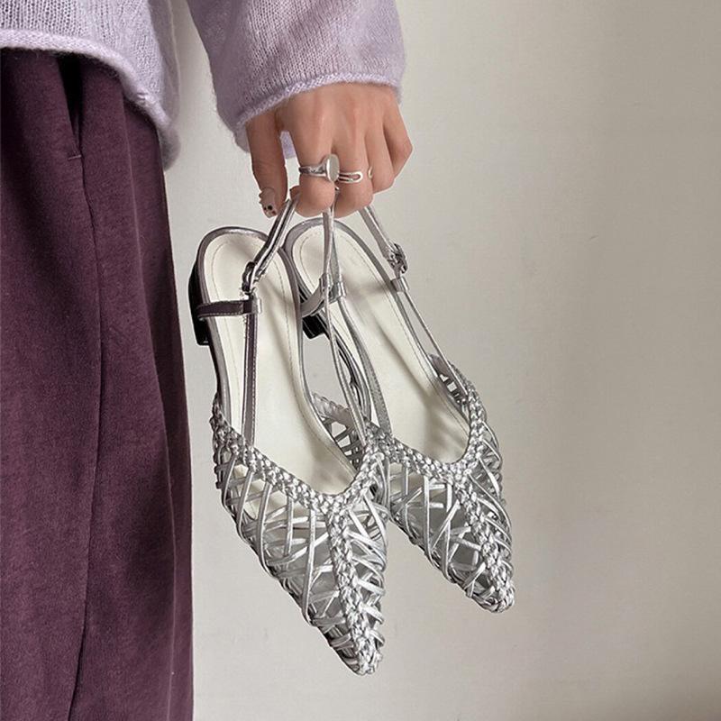 Sheepskin Korean version of niche leather woven breathable sandals women's summer flat bottom pointed hollow Muller outer wear cool slippers