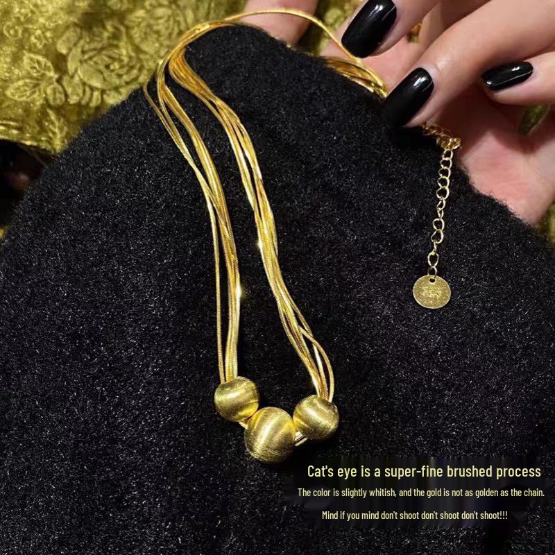

Brushed Gold Cat s Eye Necklace: Elegant Women s Light Luxury Pendant Clavicle Chain.
