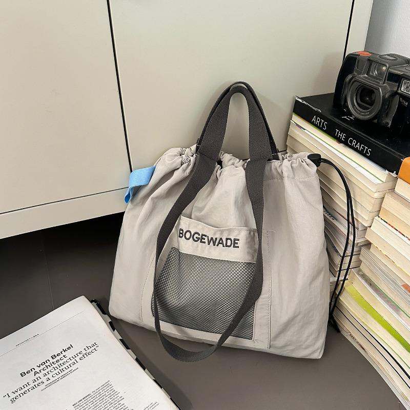 Large-capacity casual tote bag women's new fashion niche lightweight shoulder bag class commuter bag