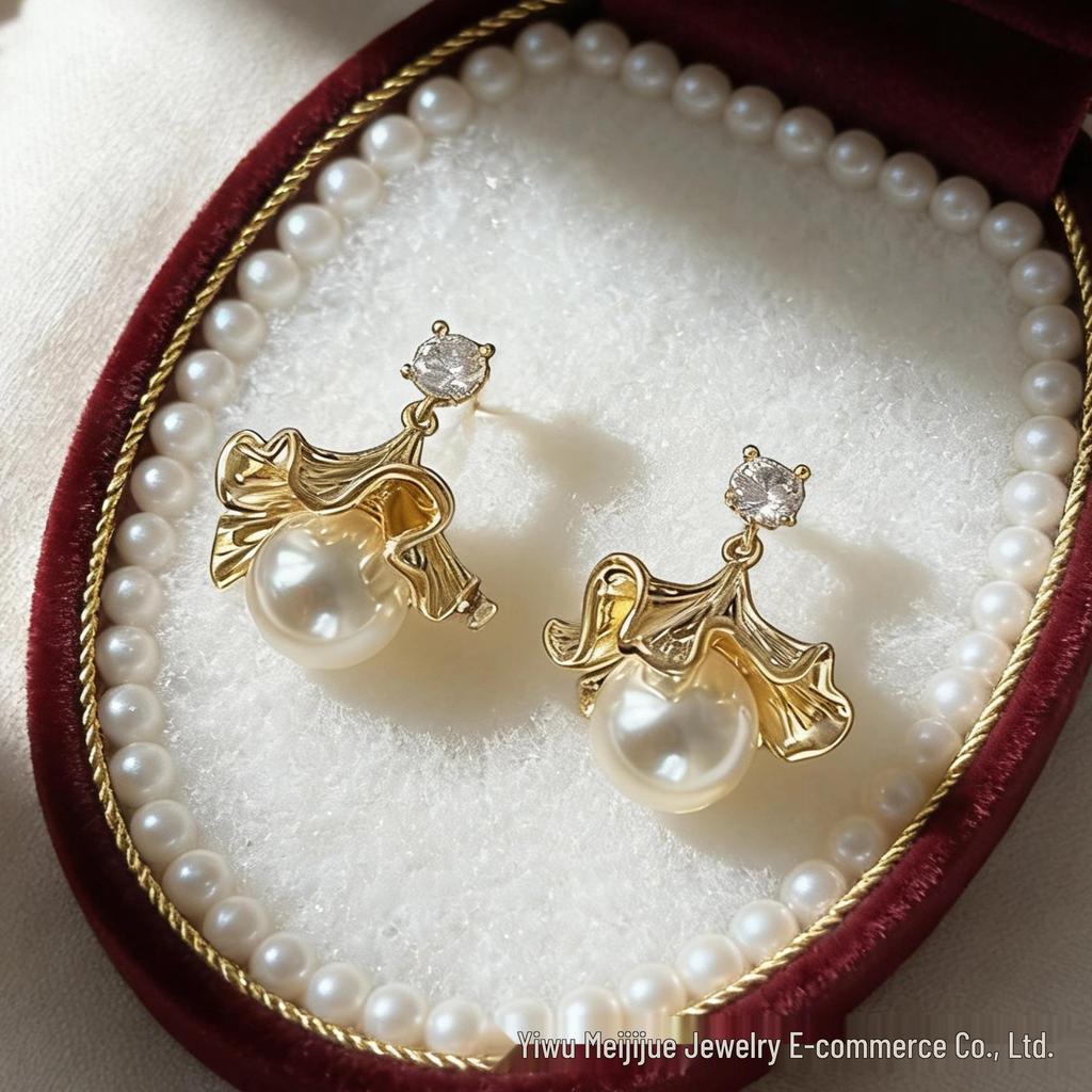 Fan-Shaped Ginkgo Leaf Pearl Tassel Earrings for Women - Light, Luxurious, High-End Statement Pieces