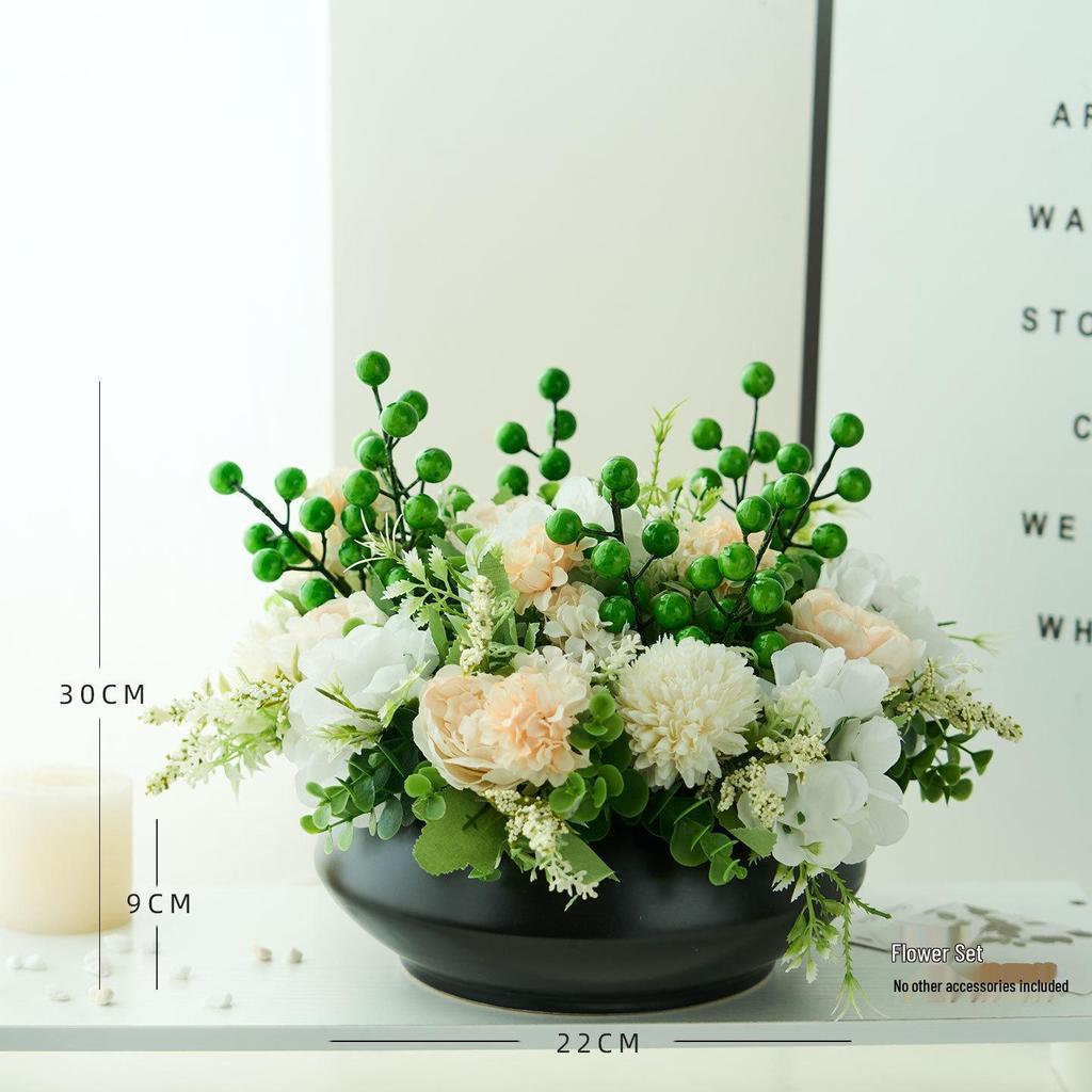 Nordisk modern sommarfräsch inomhuskonstgjord blombukett med gröna krukväxter