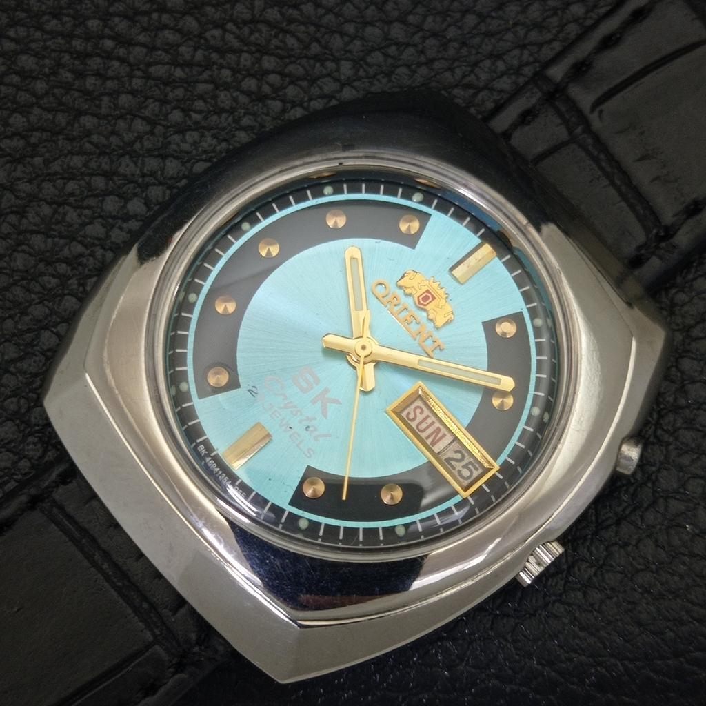 JAPAN VINTAGE ORIENT SK CRYSTAL AUTOMATIC MENS SKY BLUE DIAL WATCH a703412-1