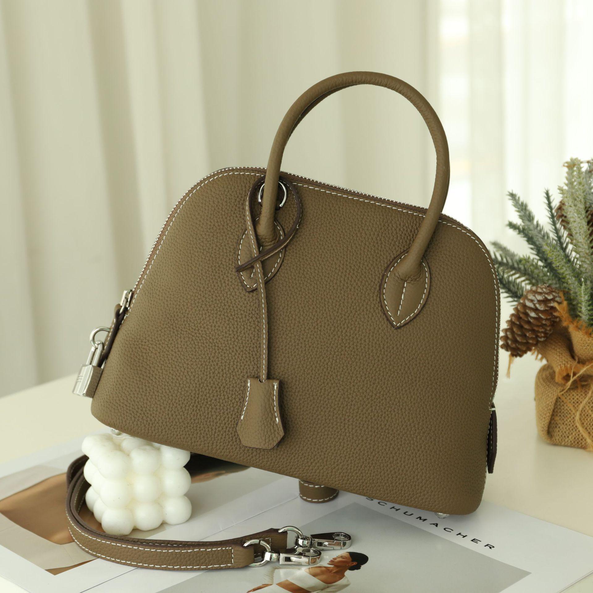 

Классическая женская сумка-боулинг из натуральной кожи Length 27, Width 10, Height 19