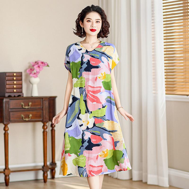 Nouvelle robe en coton et soie mode d'été pour femmes ample grande taille florale coton artificiel coton tempérament jupe moyenne et longue