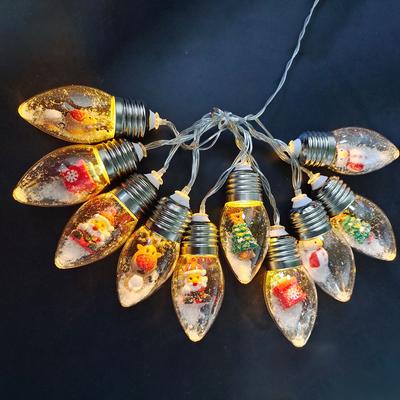 Guirlandes lumineuses charmantes en forme d'ampoule avec des personnages de dessins animés, à piles, lumières décoratives de Noël pour une fête de vacances