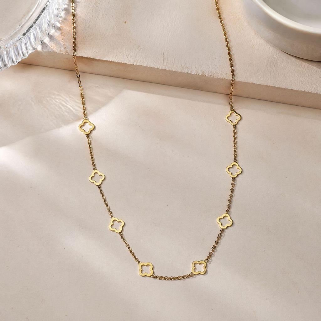 European & American Titanium Steel Hollow Four-Leaf Clover Necklace - Light Luxury, Colorfast, Versatile Thin Chain for Women