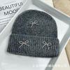 Autumn and winter new Xiaoxiangfeng steel ball bow wool hat versatile women's big head circumference ear protector knitted cold hat