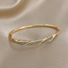 Freetry Glossy Golden Plated Round Bangle Bracelet for Women Fashion Cross Inlaid Zircon Open Spring Bangle Female Jewelry Gift