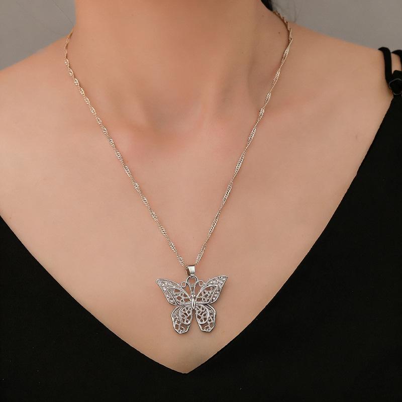 Korean Creative Cat's Eye Butterfly Necklace - Elegant & Versatile Sweater Chain