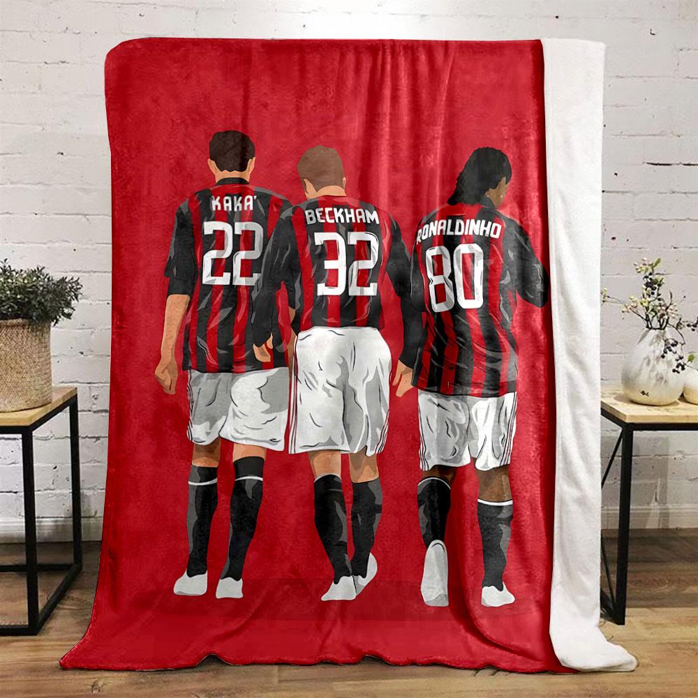 Three soccer players in red and black striped jerseys with white shorts. for all seasons blanket lunch break throw gift