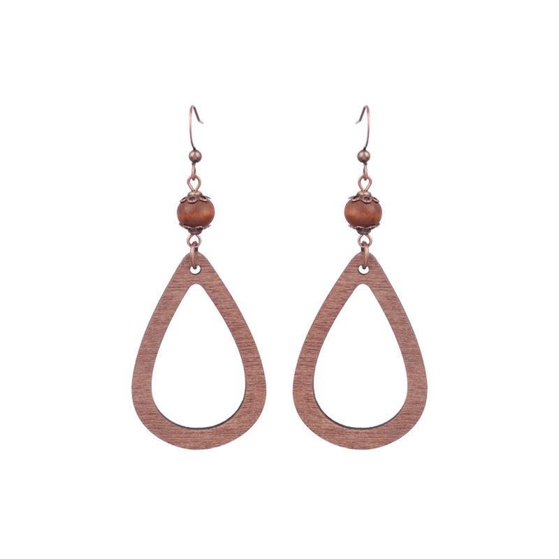 

Сережки з китицями Старовинні дерев’яні намистини Ручні геометричні порожнисті сережки