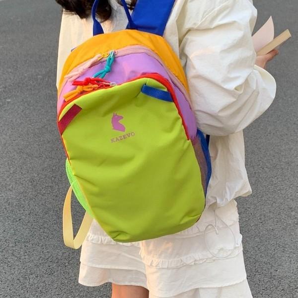 Zaino nuovo portatile colore a contrasto dopamina stile antivento anti-schizzi zaino da viaggio studente classe zaino da esterno per uomo e donna