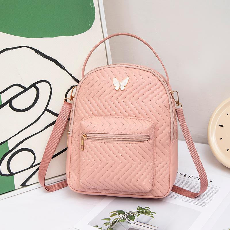 

New women s schoolbag trend butterfly logo printed backpack women s lightweight backpack shoulder bag messenger bag 21*7*25 розовый