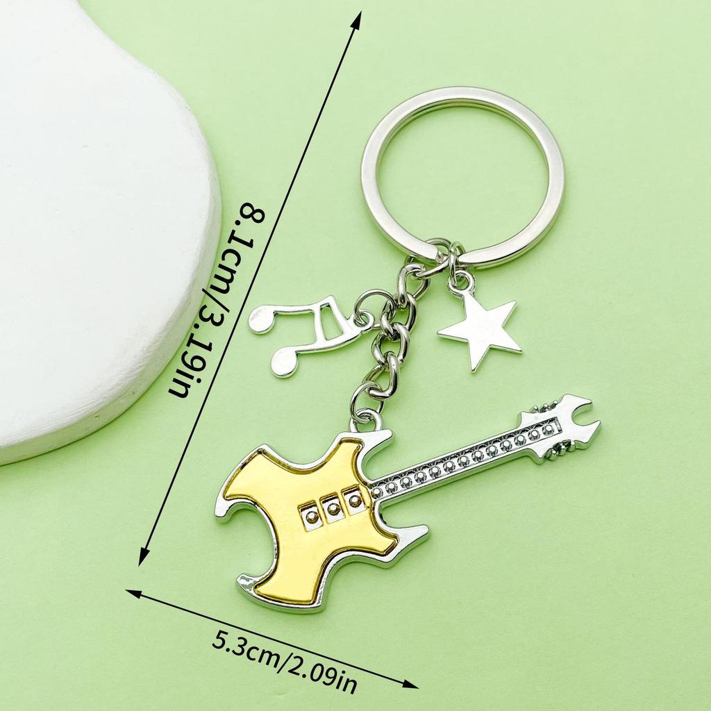 Antique Silver Music Cassette & Saxophone Keychain with Creative Design