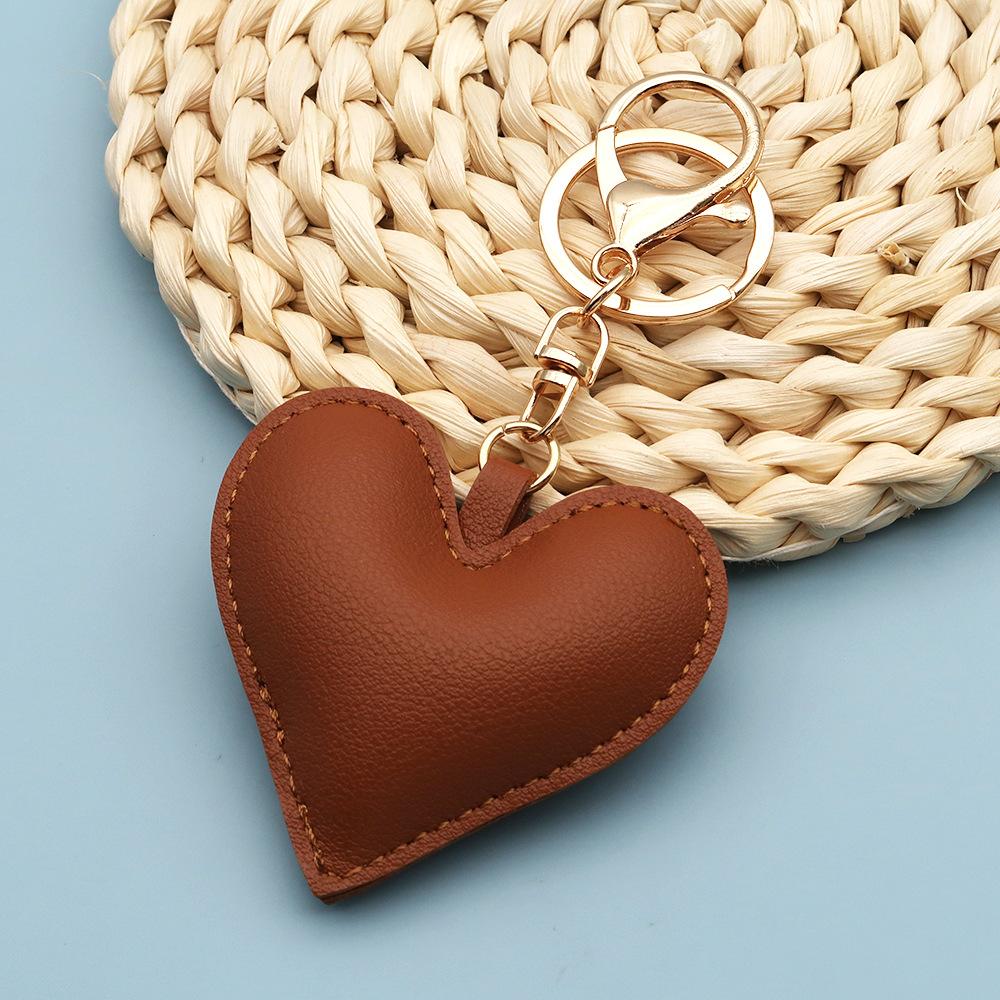 Spot wholesale PU simple peach heart bag pendant Xiaohongshu explosive love couple pendant keychain bag lanyard