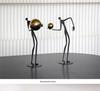 Elegant Ball-Holding Figure Sculpture Decorative Ornament for Room or Hotel