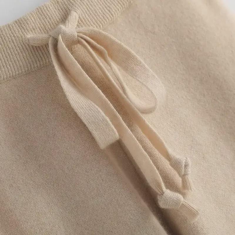 Dámské kalhoty se širokými nohavicemi z měkké vlny na podzim/zimu - Bílé splývavé pletené kalhoty v mopovacím stylu