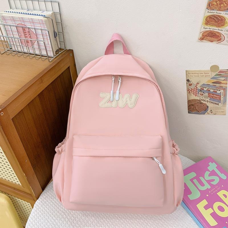 

burden reduction backpack for primary school students, first, second and third grades, large-capacity backpack travel research bag