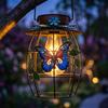 Solar Powered Outdoor Garden Lantern with Decorative Butterfly and Leaf Metal Frame Hanging Light for Patio Yard Pathway Lighting