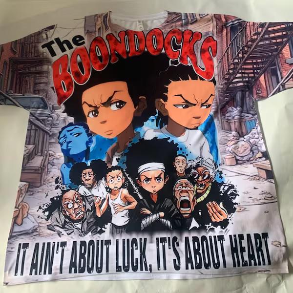 BOONDOCKS FAMILY T-SHIRT. IT AIN T ABOUT LUCK. FREEMAN RILEY, HUEY , 90 S TEES Unisex T-Shirt XXXXL