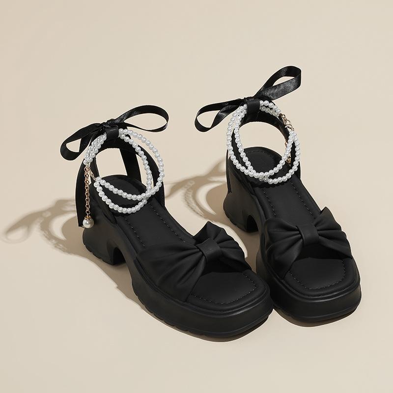 

Summer is not tired of gentle feet fairy wind pearl bow thick heel platform sandals women s sense of stepping on shit increases Roman shoes 34