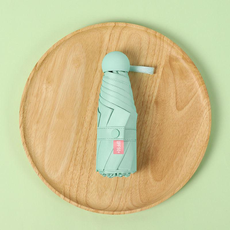 Parasol Capsule Sun Umbrella: 50% Off Mini UV Protection for Women, Dual-Purpose for Sun and Rain.