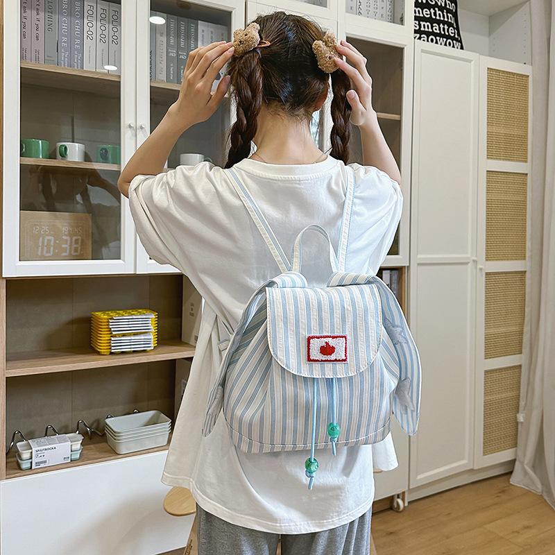Cute rabbit ear backpack female junior high school student vertical stripe contrasting color star bag high value student travel small backpack