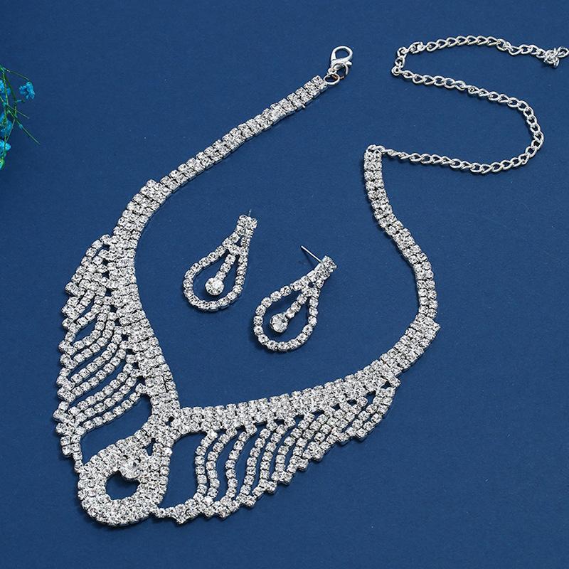 Meier Water drop full diamond flower earrings and necklace set, sparkling wedding jewelry серебро белый