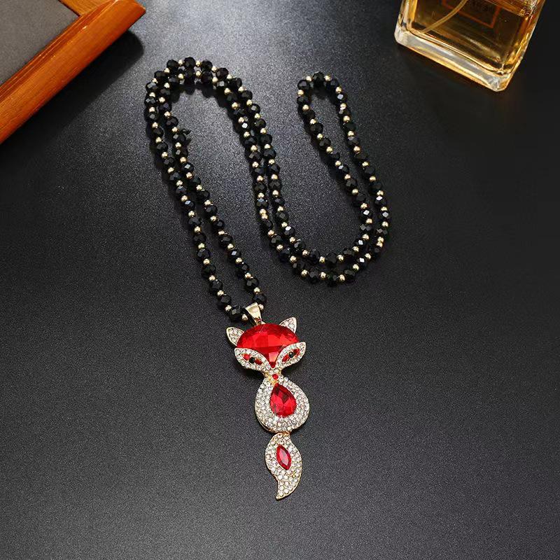 Elegant Cat's Eye Fox Pendant Necklace: Autumn/Winter Stylish Sweater Chain for Women