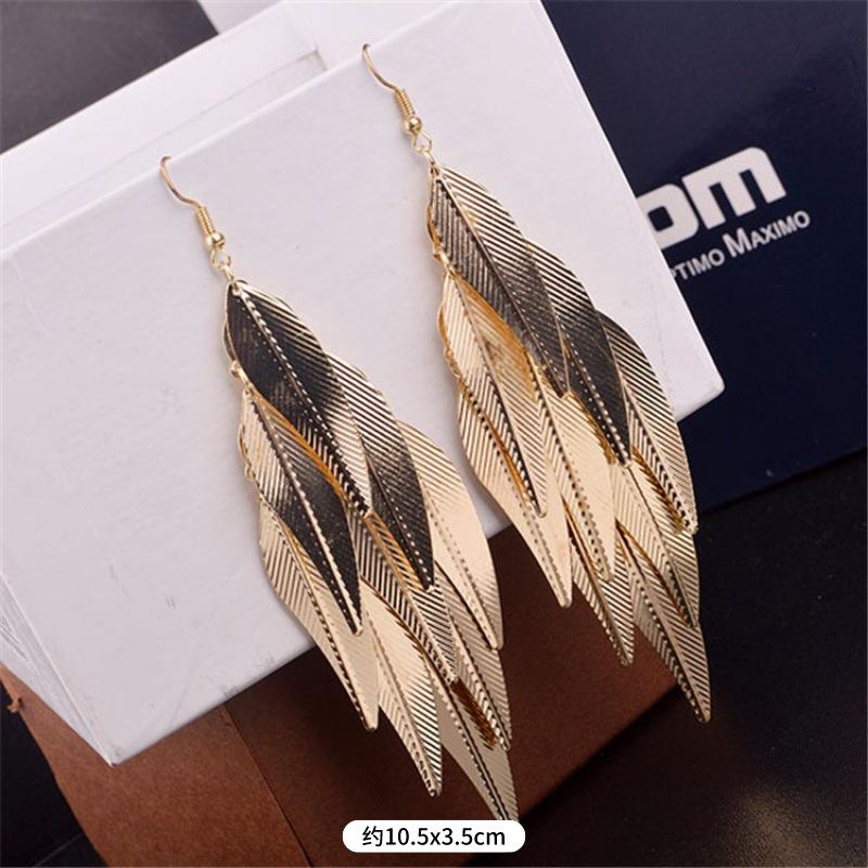 Fashion exaggerated niche temperament fringed earrings retro personality versatile sequined earrings women's long ear jewelry
