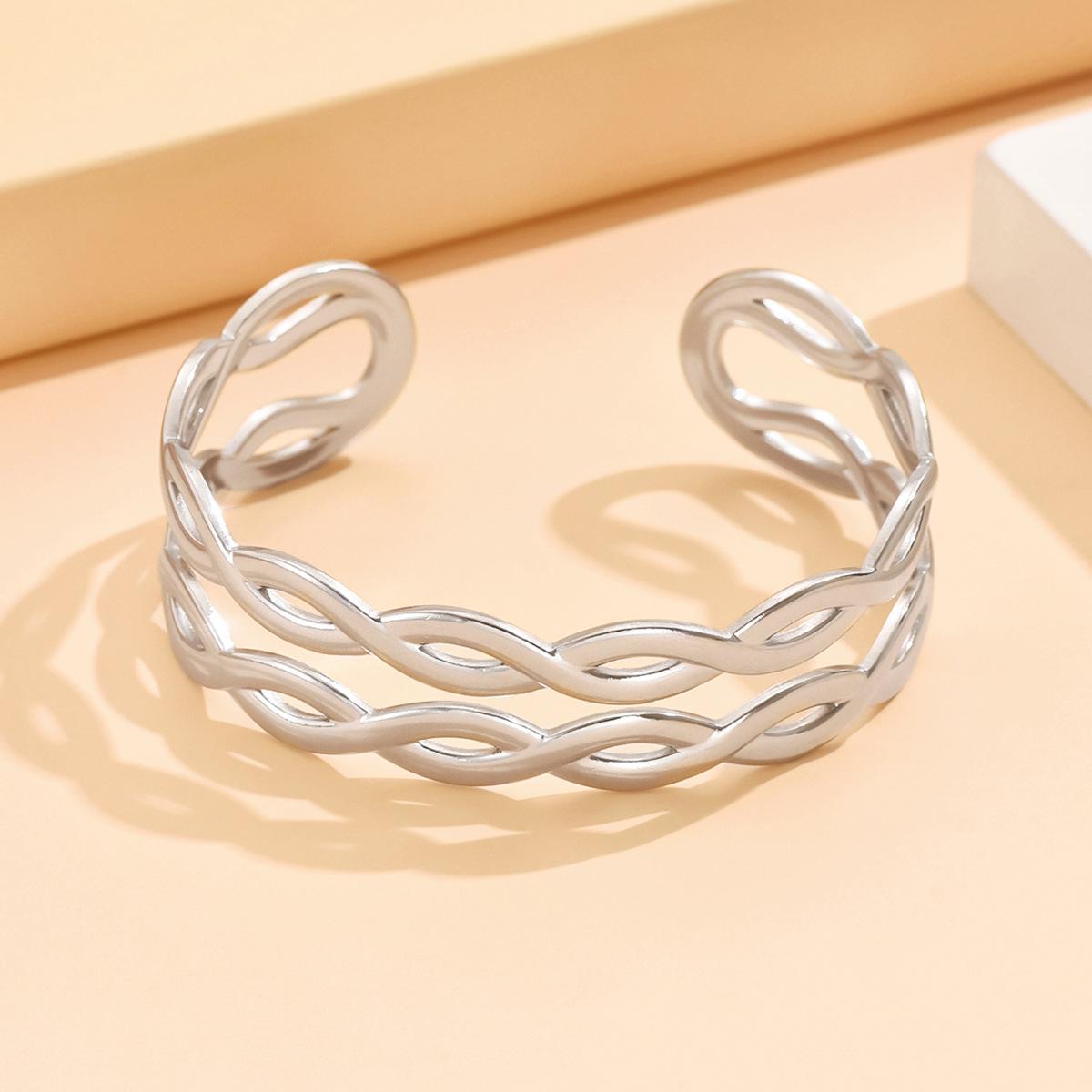 Cross Bestseller Stainless Steel Hollow Intersecting Lines Cuff Bracelet – European American Fashion, Women’s Titanium Steel Jewelry.
