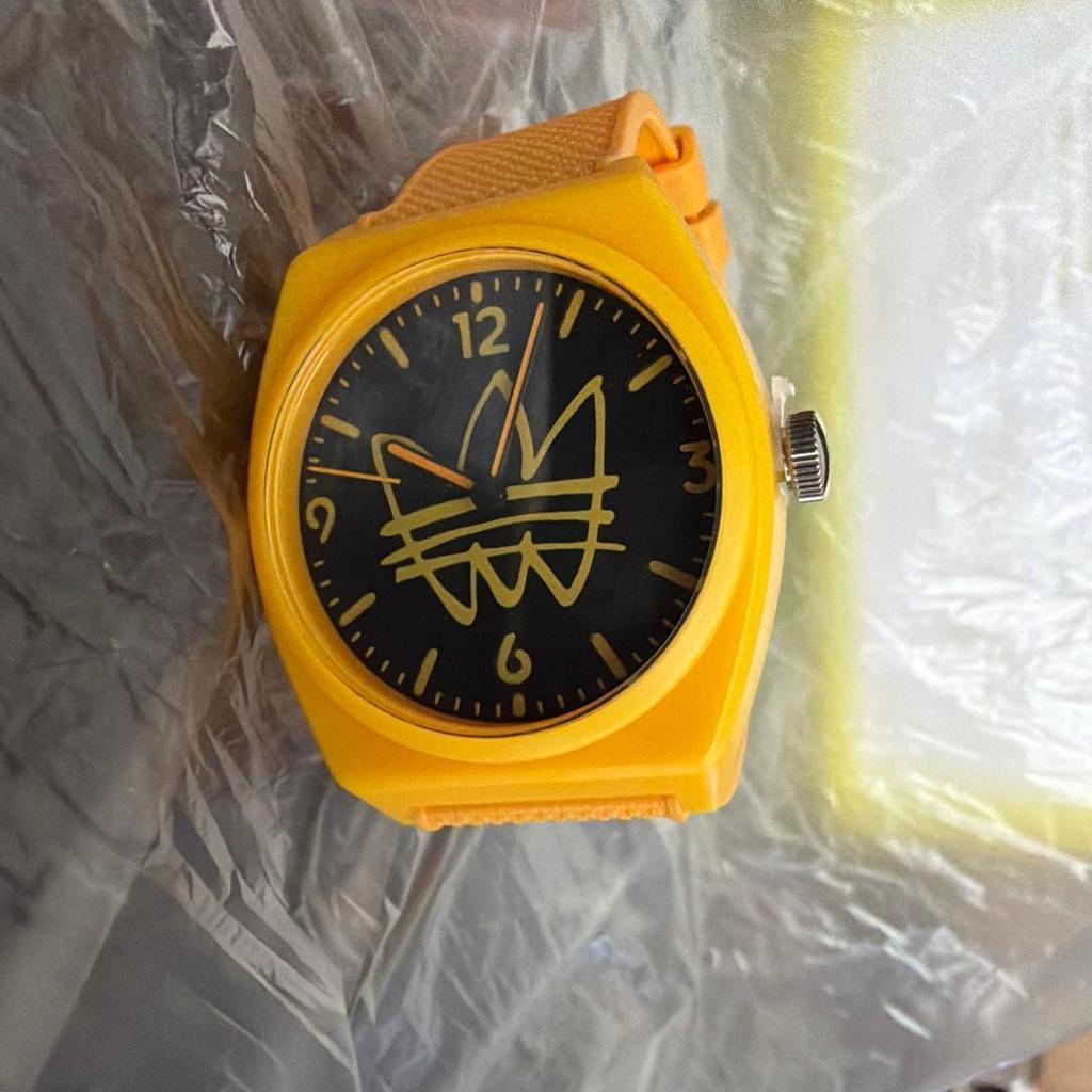 Used adidas watch yellow