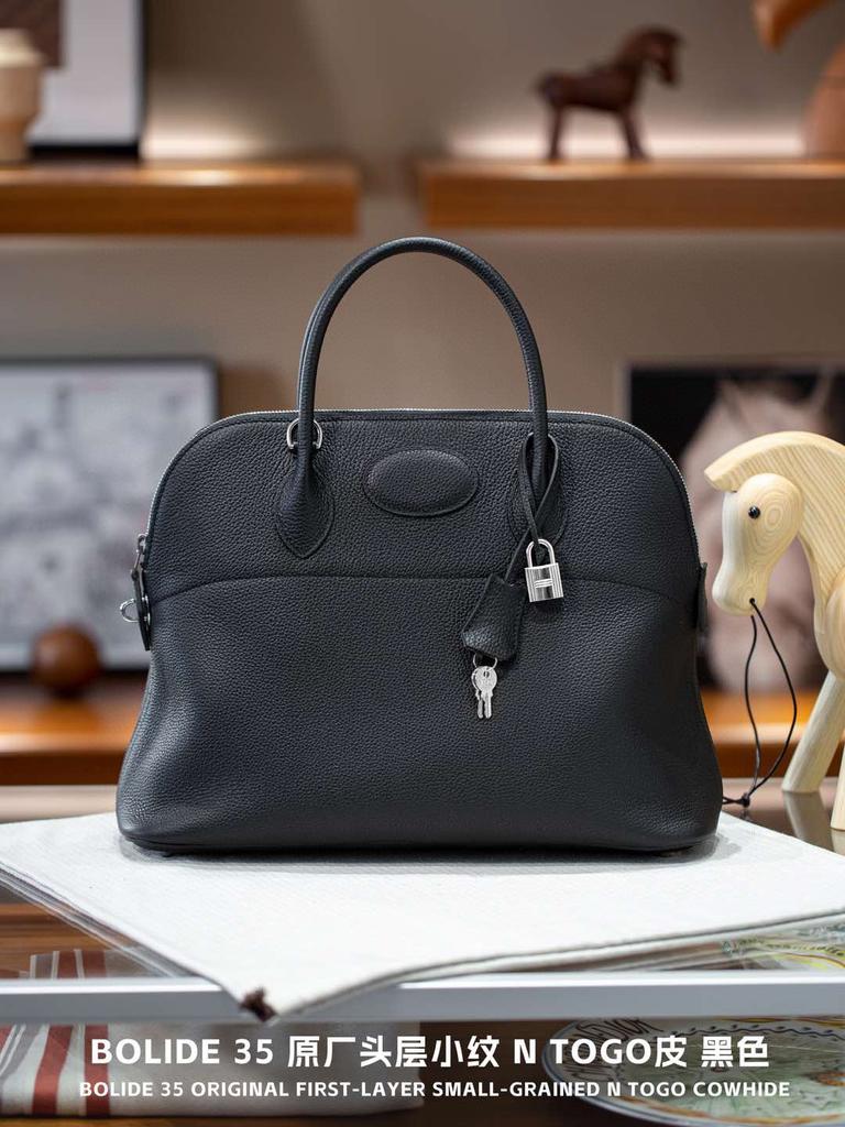 Přeshraniční první vrstva hovězí kůže nerezové kování čtyři uši ručně šitý 31/35 bowlingová kabelka dámská