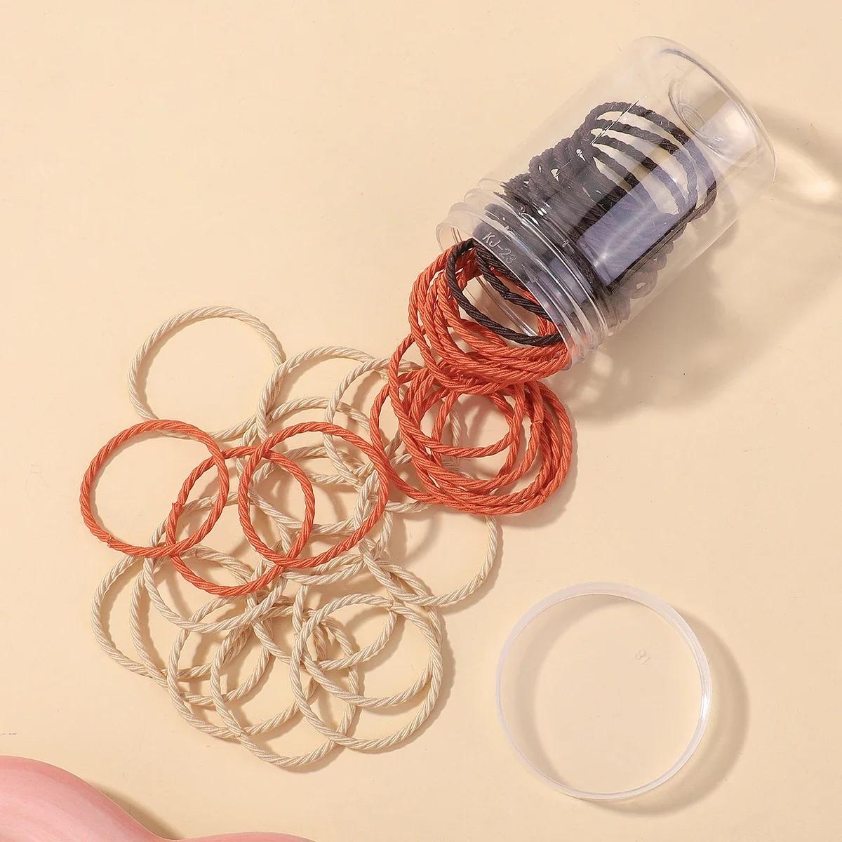 

50 шт./коробка Простота резинка для волос Высокая эластичность Резинка для женщин Прочная веревка для волос Консервированная повязка на голову Резинки для волос для высокого хвоста